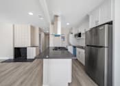 Thumbnail 1 of 18 - a renovated kitche at Wescove Apartments, California