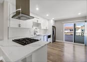 Thumbnail 2 of 64 - Renovated Kitchen area at Ocean Breeze Terrace Apartment, Huntington Beach, 92648