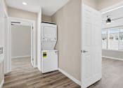 Thumbnail 3 of 10 - the enclave at homecoming terra vista laundry room at Huntington Manor Homes Apartment, Huntington Beach, California