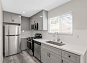 Thumbnail 1 of 19 - Kitchen Appliances at Hamilton Courtyard Apartments, California