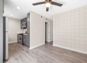 Thumbnail 11 of 18 - Living And Kitchen at Wescove Apartments, West Covina, CA, 91790