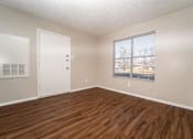 Thumbnail 29 of 38 - Bright unfurnished room with entry door at The Finley Apartments, Texas, 75228
