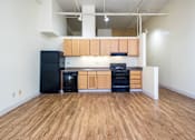Thumbnail 10 of 16 - Denver Building Housing Kitchen Featuring black appliances