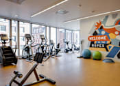 Thumbnail 3 of 78 - A gym with a sign that says "Welcome to the Ropes".