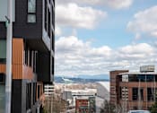 Thumbnail 18 of 19 - a view of the city and mountains from a building at Analog Tacoma, Tacoma, 98402