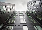 Thumbnail 7 of 19 - a view of a tall building from the ground at Analog Tacoma, Tacoma, Washington