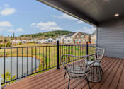 Thumbnail 30 of 46 - Balcony with beautiful lake view at Thrive at Green Mountain, Washington