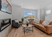 Thumbnail 5 of 46 - Television And Fireplace In Living Room at Thrive at Green Mountain, Camas, WA, Washington  , 98607