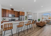Thumbnail 1 of 46 - Fully Equipped Modern Eat-In Kitchen at Thrive at Green Mountain, Camas, Washington