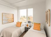 Thumbnail 5 of 16 - Bedroom at Nomad Apartments, Portland, OR