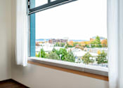 Thumbnail 18 of 27 - Window with a view of a cityscape at Atomic Orchard Experiment, Portland, OR