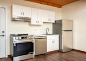 Thumbnail 3 of 27 - Kitchen with stove at Atomic Orchard Experiment, Portland, OR
