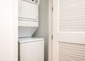 Thumbnail 30 of 78 - A white dishwasher is installed in a kitchen.