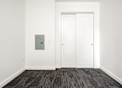 Thumbnail 52 of 78 - A white door with a grey box on the wall.