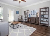 Thumbnail 28 of 31 - a living room with a couch and a coffee table at Carrington Place at Wildewood, Columbia, SC  