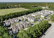 Thumbnail 23 of 23 - A large group of houses are clustered together in a suburban area.
