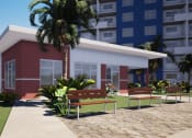 Thumbnail 2 of 23 - a rendering of a building with a bench and a palm tree in front of it