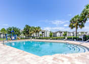 Thumbnail 6 of 6 - the preserve at ballantyne commons community pool with apartment buildings in the background