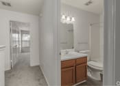 Thumbnail 21 of 26 - Bathroom With Storage at Greens of Concord, Concord