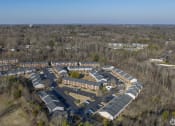 Thumbnail 25 of 26 - Aerial view of a group of houses in a city at Greens of Concord, Concord, NC, 28025