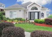 Thumbnail 1 of 13 - a small white house with a yard and a sidewalk