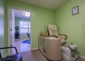 Thumbnail 21 of 28 - a dental room with a chair and a basket in it