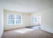 Thumbnail 1 of 28 - the living room and dining room of an empty apartment