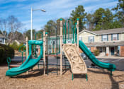 Thumbnail 9 of 21 - our apartments have a playground for kids to play at Pendleton Townhomes Apartments, Durham, NC, 27703