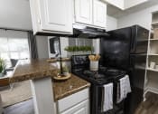 Thumbnail 15 of 17 - Fully Equipped Kitchen With Modern Appliances at Dwell at Greenridge, North Charleston, South Carolina