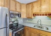 Thumbnail 26 of 27 - Fully Equipped Kitchen at Campus Park, Duluth, 55811
