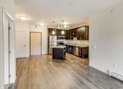 Thumbnail 27 of 35 - a kitchen with a stove and a refrigerator at Arbor Ridge, Forest Lake, 55025