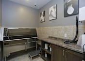 Thumbnail 32 of 35 - a bathroom with a sink and a stove in it at Arbor Ridge, Forest Lake, MN, 55025