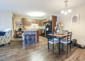 Thumbnail 31 of 32 - a kitchen and dining room with a table and chairs at Boulder Ridge, Duluth