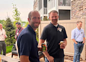 Thumbnail 41 of 67 - two men standing in front of a house holding beers  at Timber Ridge, Minnesota