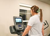 Thumbnail 5 of 67 - a woman running on a treadmill at the gym  at Timber Ridge, Minnesota