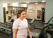 Thumbnail 59 of 67 - a woman on a treadmill at the gym  at Timber Ridge, Minnesota