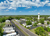 Thumbnail 8 of 16 - an aerial view of a neighborhood with a water tower