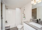 Thumbnail 22 of 40 - Bathroom with a sink and a toilet  at Avery Park in Englewood, CO