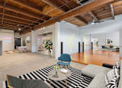 Thumbnail 7 of 57 - A dance studio is located in the back of this open plan office space.