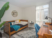 Thumbnail 7 of 61 - Spacious second bedroom with floor to ceiling window
