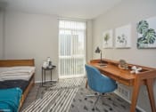 Thumbnail 8 of 61 - Bedroom with upgraded wood plank flooring