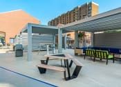 Thumbnail 39 of 82 - Nice shaded areas to grill and chill at Trillium Apartments, Fairfax, VA, 22031