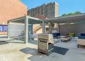 Thumbnail 40 of 82 - Enjoy the fire pit while you BBQ on our deluxe gas grills at Trillium Apartments, Fairfax, VA