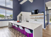 Thumbnail 36 of 61 - Bar seating in the kitchen space