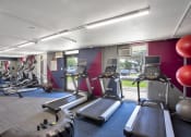 Thumbnail 25 of 61 - Plenty of work out equipment for residents to use