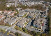 Thumbnail 20 of 20 - A bird's eye view of a residential area with houses and roads.