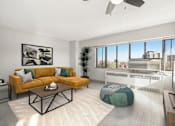 Thumbnail 1 of 50 - Spacious living area with a wall of windows and a ceiling fan