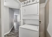 Thumbnail 7 of 40 - Dedicated laundry closet with washer and dryer connections inside a 3-bedroom, 2-bath apartment at Gregory Cove in Jacksonville, FL.
