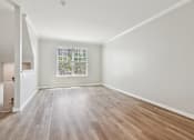 Thumbnail 7 of 48 - Davey Two Bedroom Townhome - large living room with rich wood flooring
