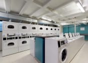 Thumbnail 24 of 30 - Laundry facility at Bridgeyard Apartments in Alexandria, VA